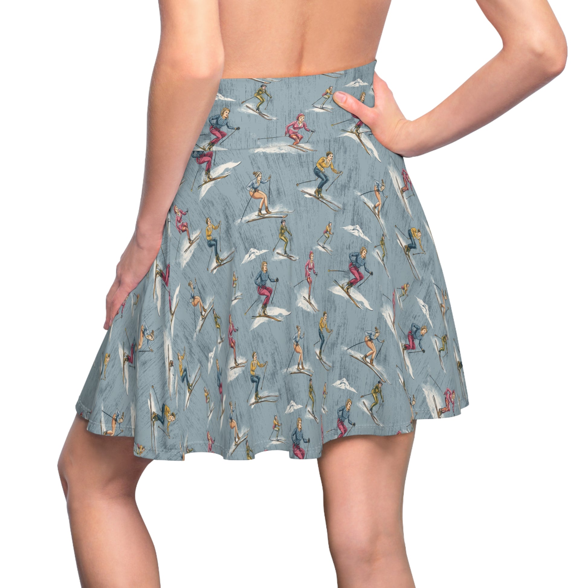 Skirt with a pattern of people skiing on a blue background